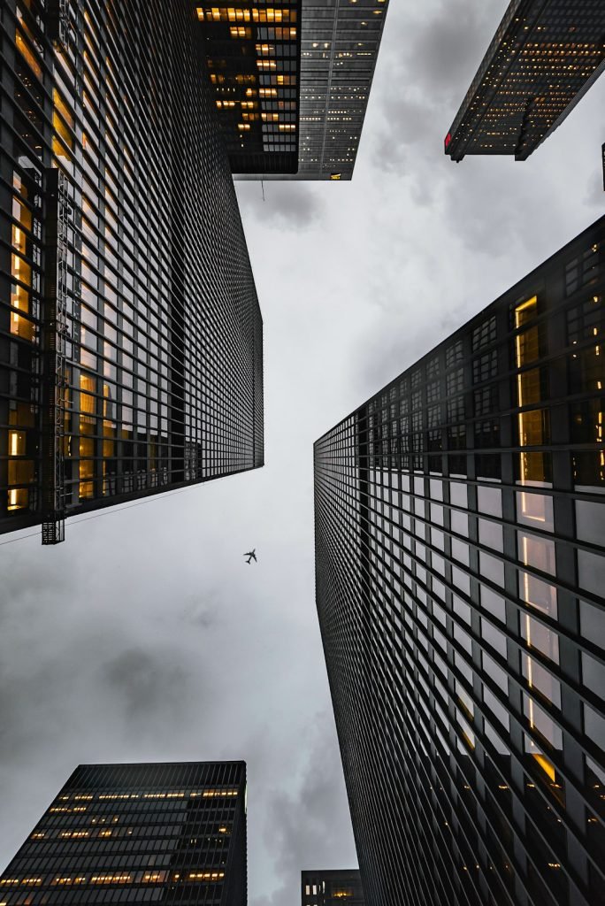 low-angle-photo-of-black-high-rise-concrete-city-buildings-vd-tgp0qilu Always look up